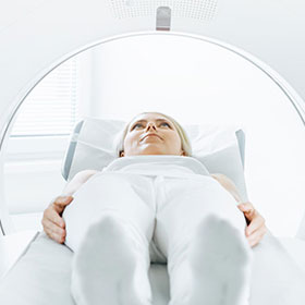 Woman in CT Scanner